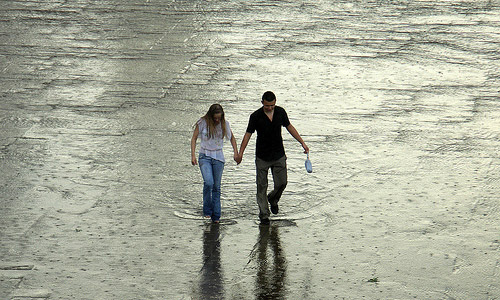 100 Ways To Be Romantic - Go For A Walk In The Rain With Him Without Umbrellas.