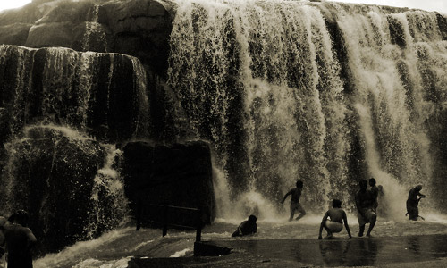 Dancing under a waterfall