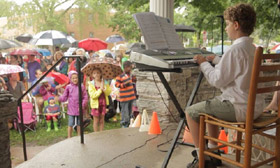 Hundreds Of Strangers Stood In The Rain To Encourage This 8-Year Old For His Piano Concert